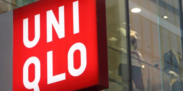 A sign hangs outside Fast Retailing Co.'s Uniqlo store in the Ginza district of Tokyo, Japan, on Thursday, April 8, 2010. Fast Retailing Co., Japan's largest clothing retailer, raised its full-year profit forecast 5.2 percent and said it may list shares overseas, where it expects operating profit to more than quadruple this fiscal year. Photographer: Tomohiro Ohsumi/Bloomberg via Getty Images